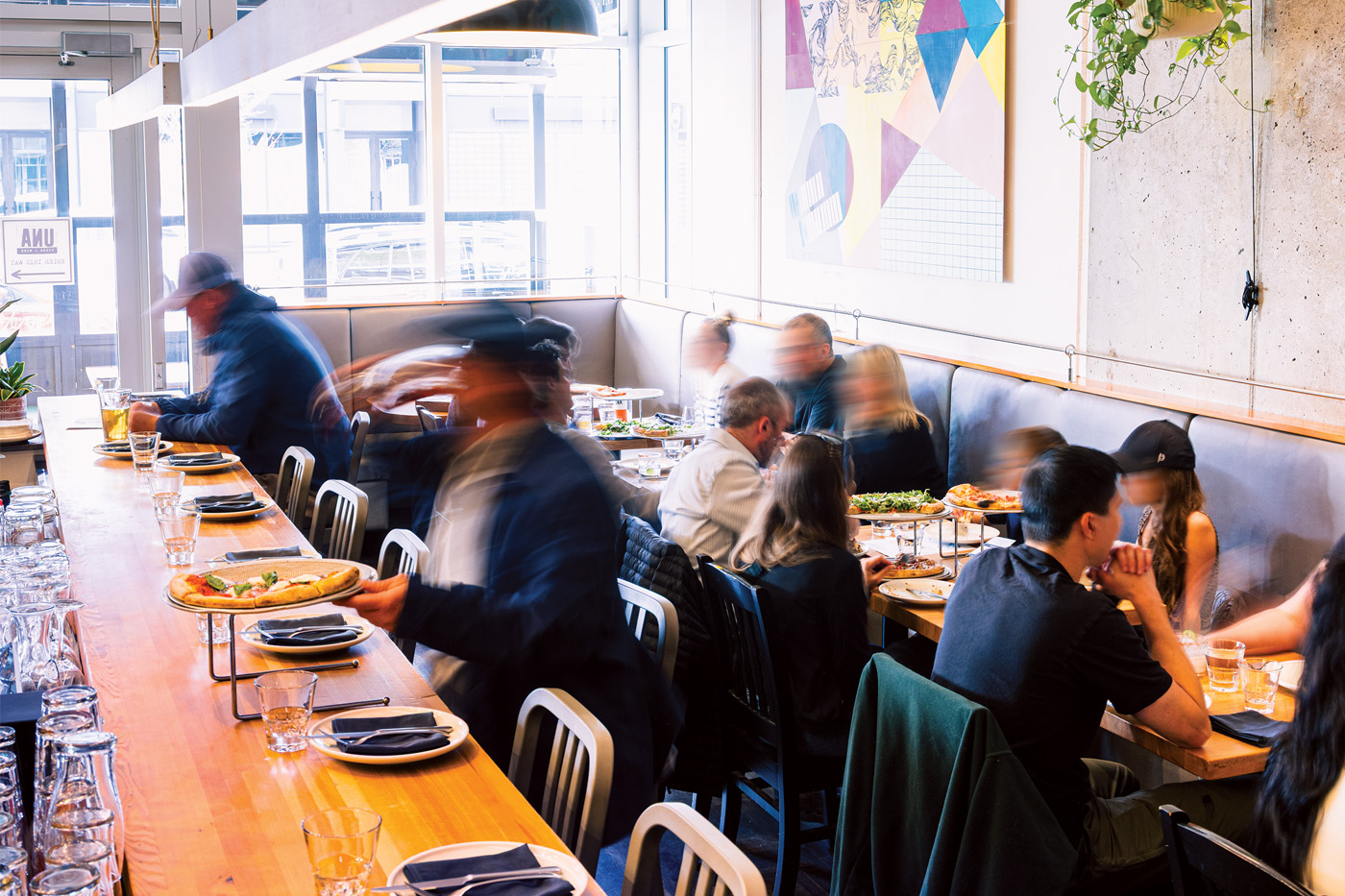 People dine in at a restaurant in the neighbourhood of West Springs.